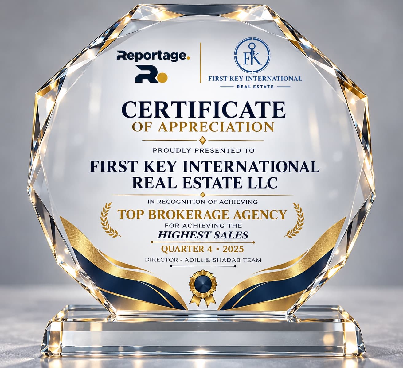 Reportage crystal trophy naming First Key International Real Estate LLC Top Brokerage Agency for the highest sales in Quarter 4 2025