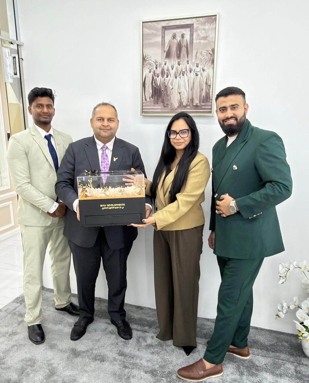 BNW Developments token of appreciation presented to the First Key International team at the office